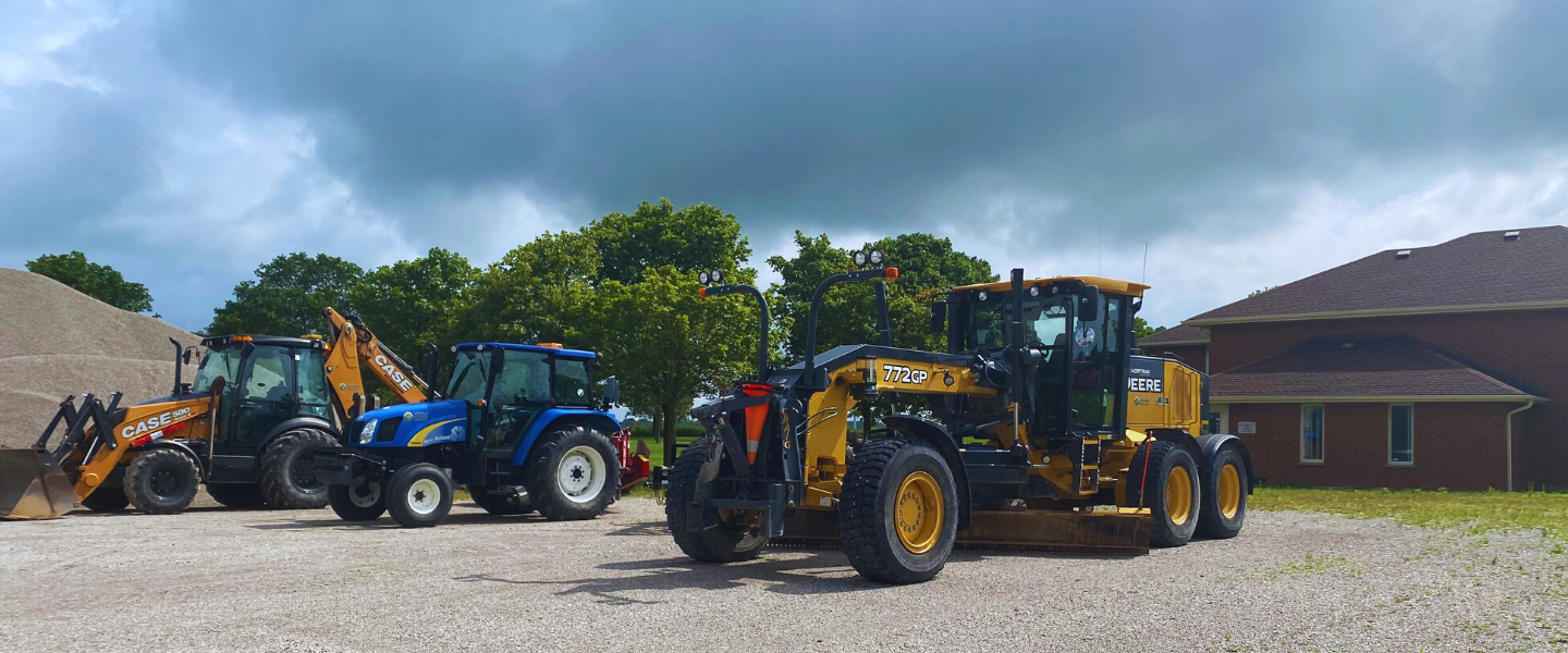 Line of Tractors Outside Township Office