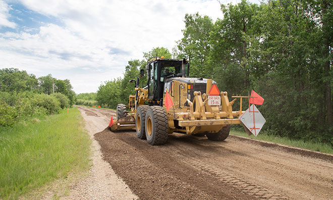Picture of a vehicle maintaining gravel
