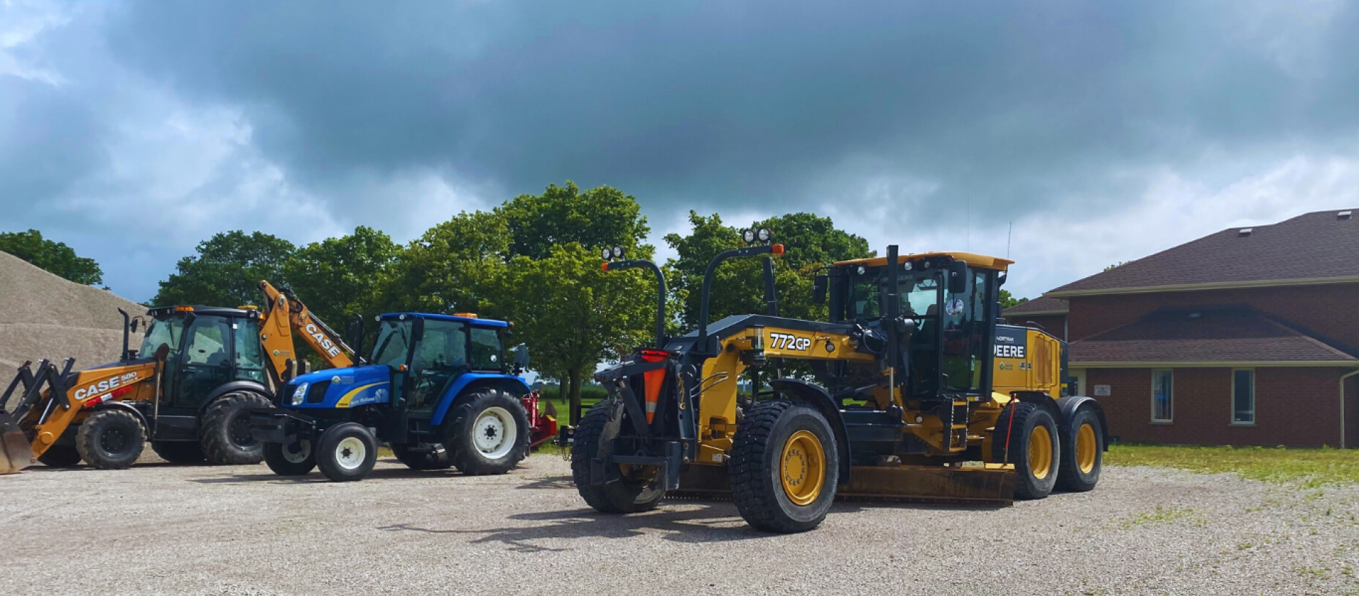 Line of Tractors Outside Township Office